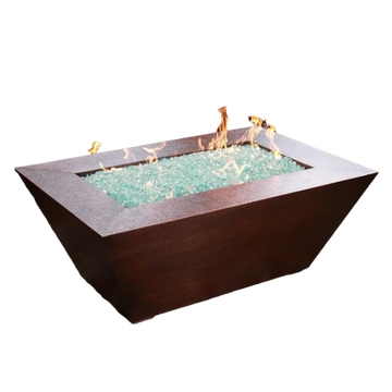canyon styled copper fire pit with light blue fire glass