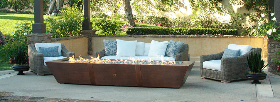 copper large fire pit table with seating on one side